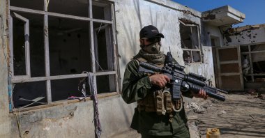 A Taliban inspects the scene of an operation against Daesh militants in Kabul, Afghanistan, Feb. 27, 2023. (EPA Photo)
