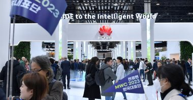 Visitors walk next to Chinese manufacturer Huawei's stand at the Mobile World Congress (MWC), the telecom industry's biggest annual gathering, in Barcelona, Spain, Feb. 28, 2023. (AFP photo)