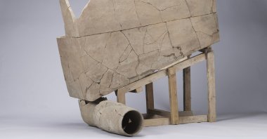 A lavatory, which is comprised of a toilet seat and sewage system, excavated from the Yueyang archaeological site in Xi'an, Shaanxi province, northwest China, Feb. 19, 2023. (AP Photo)