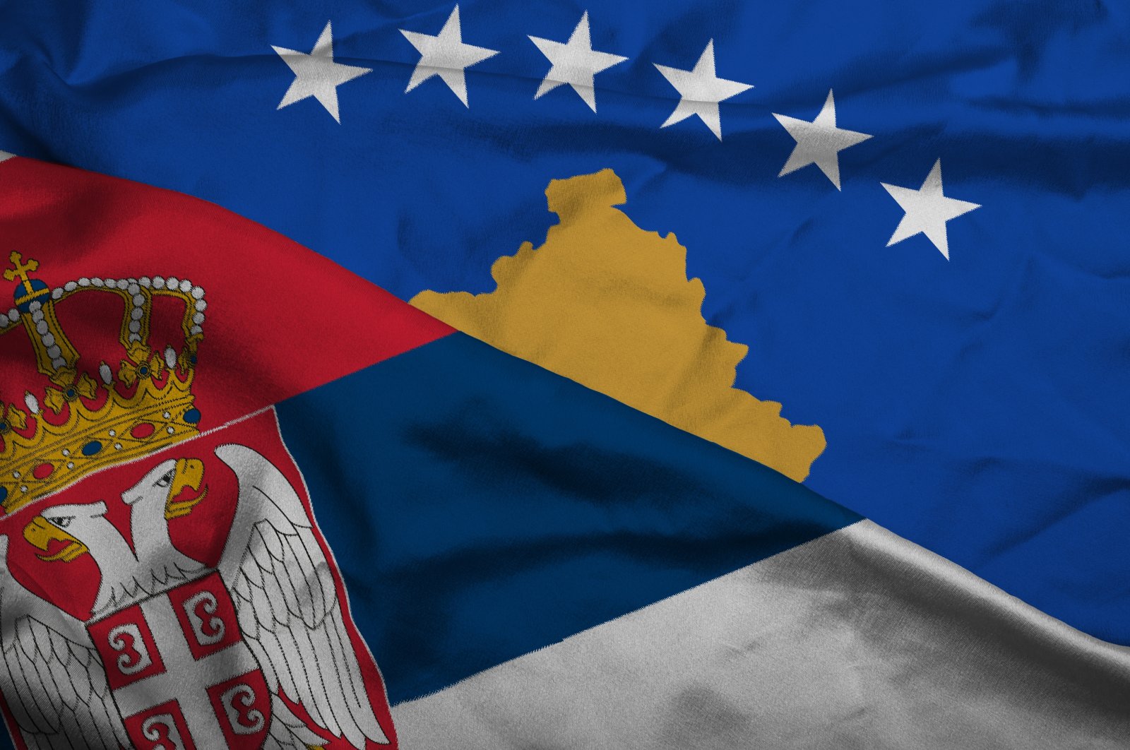 This illustration shows the flags of Serbia and Kosovo.