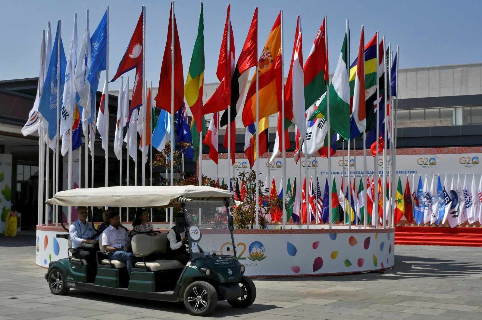 Delegates ride in a buggy at the G-20 finance officials meeting venue near Bengaluru, India, Feb. 22, 2023. (Reuters Photo)