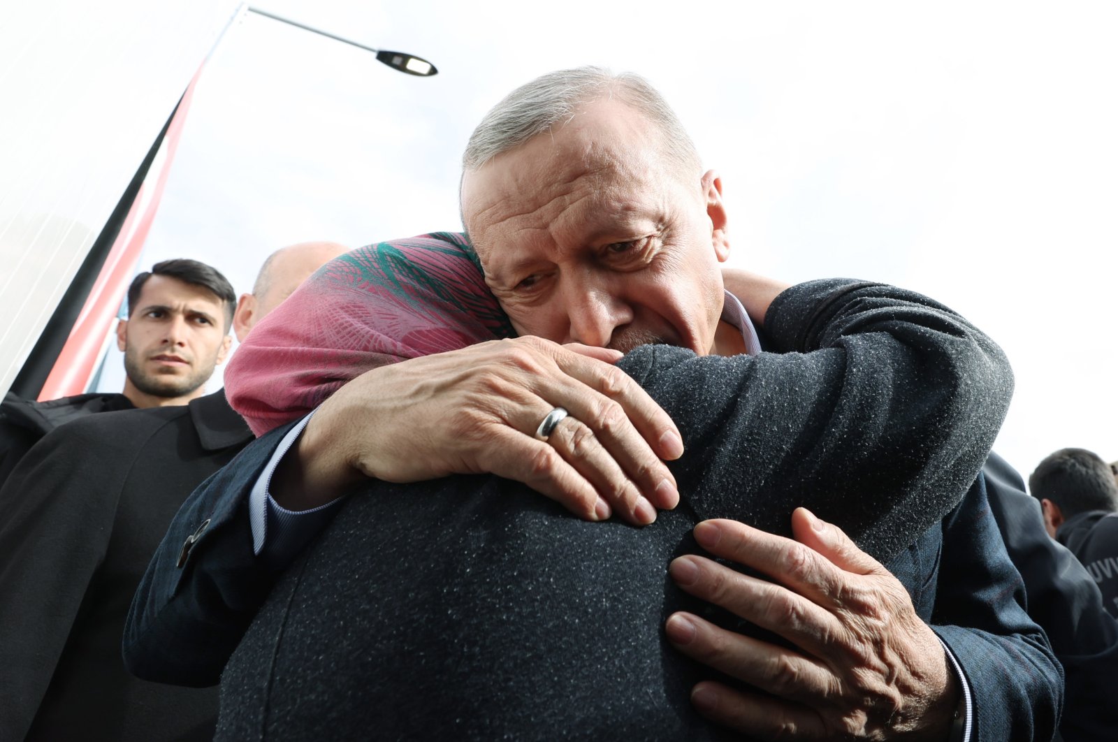 President Recep Tayyip Erdoğan hugs an earthquake survivor in Elbistan, Kahramanmaraş, southern Türkiye, Feb. 28, 2023. (AA Photo)