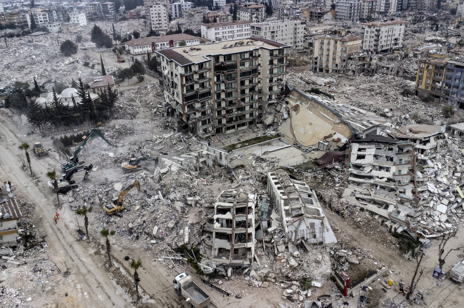 An aerial view taken with a drone shows collapsed buildings after a powerful earthquake in Hatay, southern Türkiye, Feb. 21, 2023. (EPA Photo)