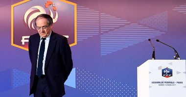 File photo of outgoing president of French football federation (FFF) standing on stage after winning the presidency vote, Paris, France, March 18, 2017. (AFP Photo)