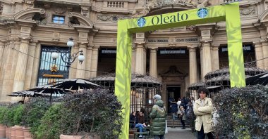 A view of the Starbucks Reserve Roastery in Milan&#039;s city center with a banner advertising the new &quot;Oleato&quot; olive oil-infused coffee in Milan, Italy, Feb. 22, 2023. (Reuters Photo)