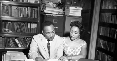 American Baptist minister and activist Martin Luther King Jr. and his wife, author, activist and civil rights leader Coretta Scott King at his office in Atlanta, Georgia, U.S. July 1962. (Getty Images Photo)