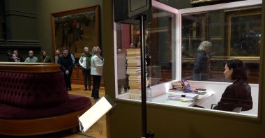 Belgian writer Saskia De Coster locked herself in a 12-square-meter glass room at the Royal Museum of Fine Arts in Antwerp, Belgium, Feb. 1, 2023. (AA Photo)