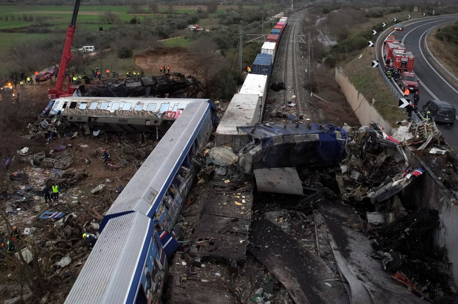 Rescue crews operate at the site of a crash, where two trains collided, near the city of Larissa, Greece, March 1, 2023. (Reuters Photo)