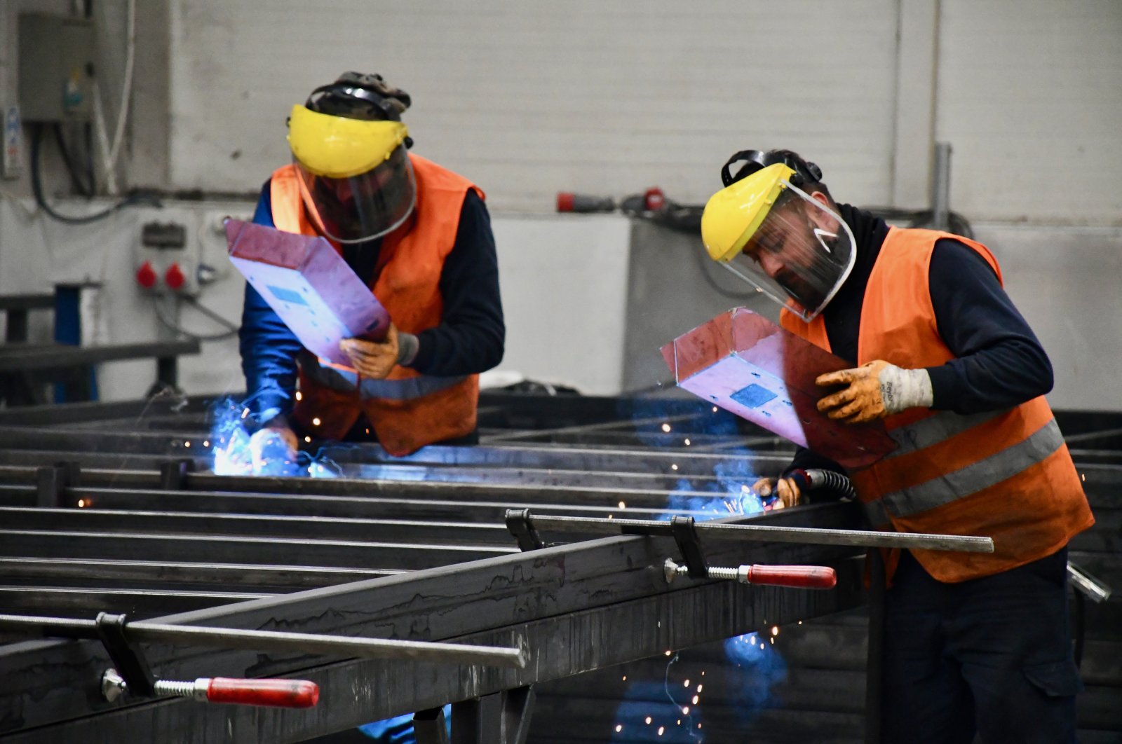 Employees engaged in a production of a container for earthquake-hit provinces are seen at a factory in Düzce province, northwestern Türkiye, Feb. 25, 2023. (AA Photo)