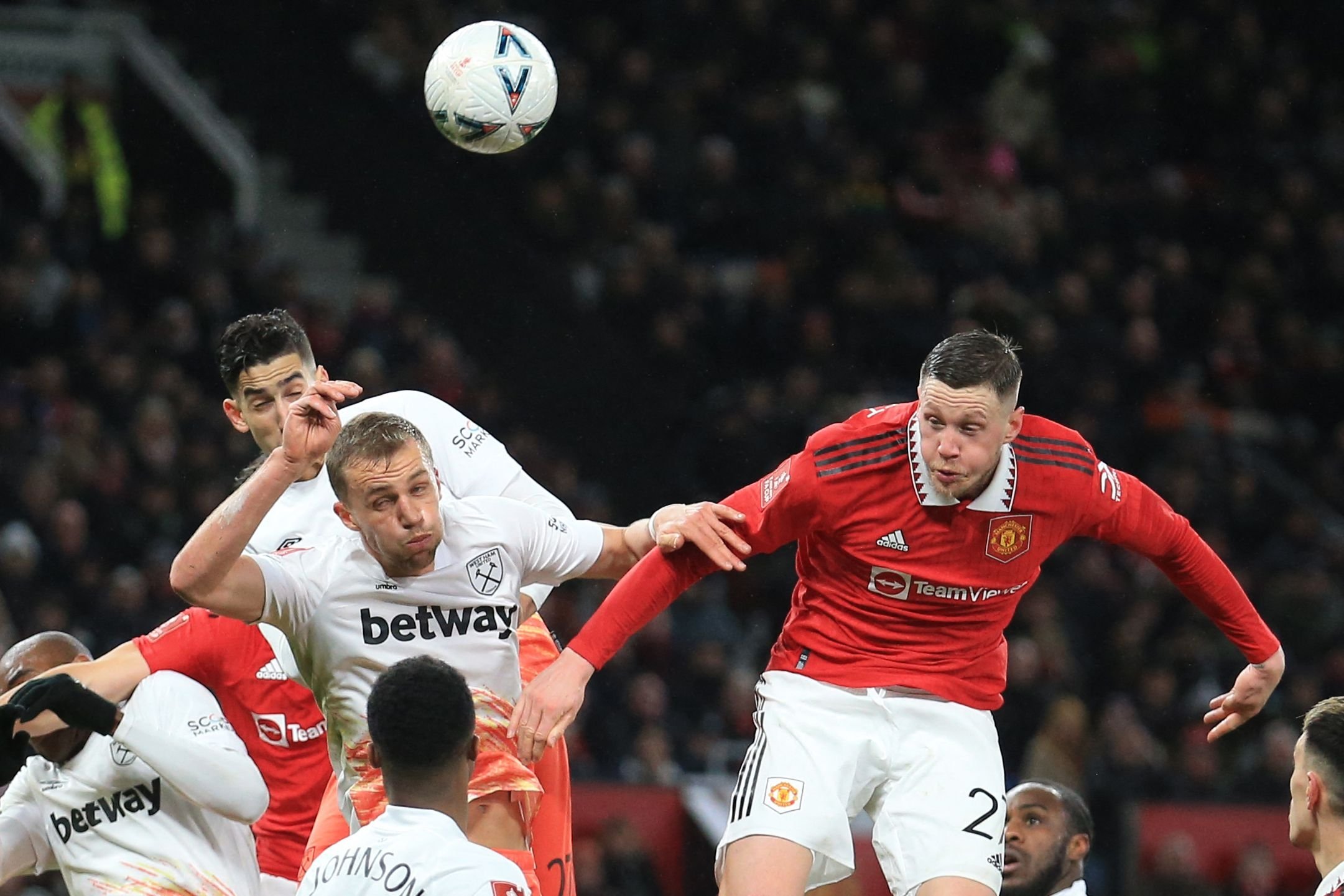 Manchester United's Dutch striker Wout Weghorst (R) scores his team first goal during the English FA Cup fifth round football match against West Ham at Old Trafford, Manchester, UK., March 1, 2023. (AFP Photo)