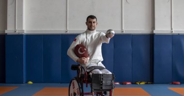 Paralympic fencer Hakan Akkaya poses for a photo after an interview at the Turkish Olympic Preparation Center, Ankara, Türkiye, March 2, 2023. (AA Photo)
