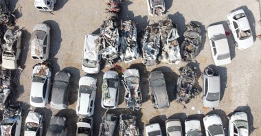An aerial view of a parking lot where cars damaged in the earthquakes are being stored, Adıyaman, southeastern Türkiye, Feb. 27, 2023. (IHA Photo)