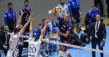 Halkbank's Abdel Azez Nimir (2nd R) in action with Arkas Spor's Mustafa Cengiz (2nd L) and Mirza Lagumdzija (L) during a AXA Sigorta Efeler League match at Halkbank Atatürk Volleyball Hall, Ankara, Türkiye, Feb. 4, 2023. (AA Photo)