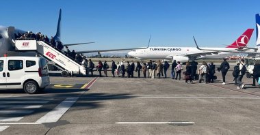 People board a Turkish Airlines (THY) plane in this undated photo. (AA File Photo)