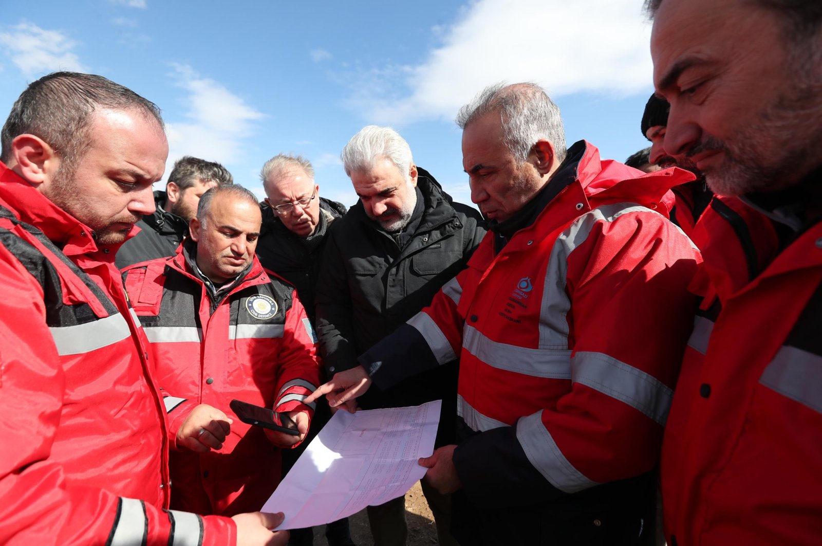 Osman Nuri Kabaktepe, the Istanbul provincial chairperson of the ruling Justice and Development Party (AK Party), receives information from the rescue and relief team of Istanbul&#039;s Sultangazi Municipality in quake-hit Adıyaman, southern Türkiye, Feb. 15, 2023. (Courtesy of the AK Party)