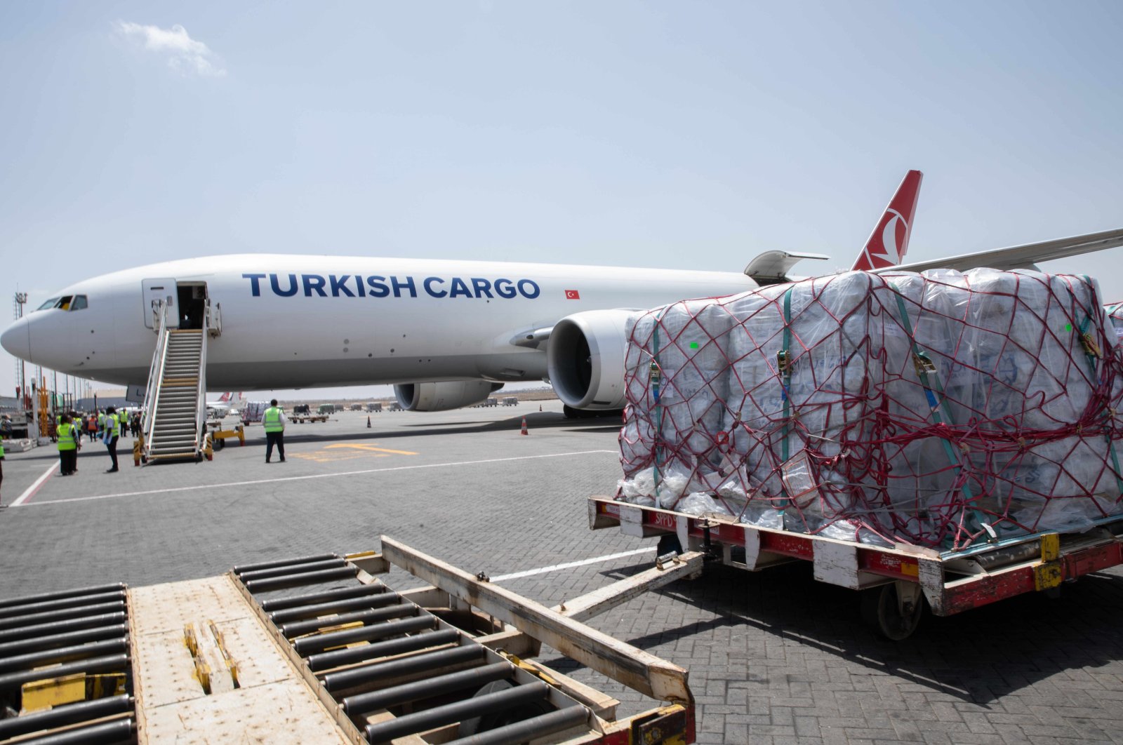 A Turkish Airlines plane being loaded with UN quake aid is seen in Nairobi, Kenya, Feb. 25. 2023. (AA Photo)