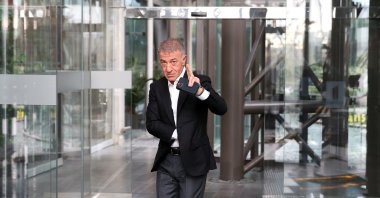 Trabzonspor President Ahmet Ağaoğlu waves at the fans after the Clubs Union Foundation meeting, Istanbul, Türkiye, Nov. 24. 2022. (DHA Photo)
