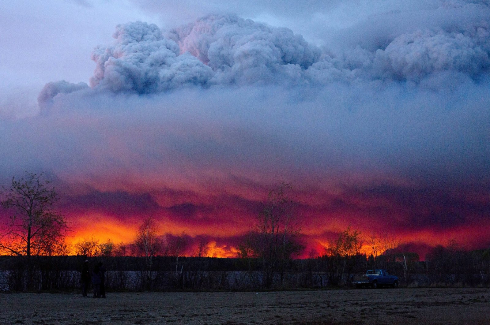 A wildfire moves towards the town of Anzac from Fort McMurray, Alberta, Canada, May 4, 2016. (AP Photo)