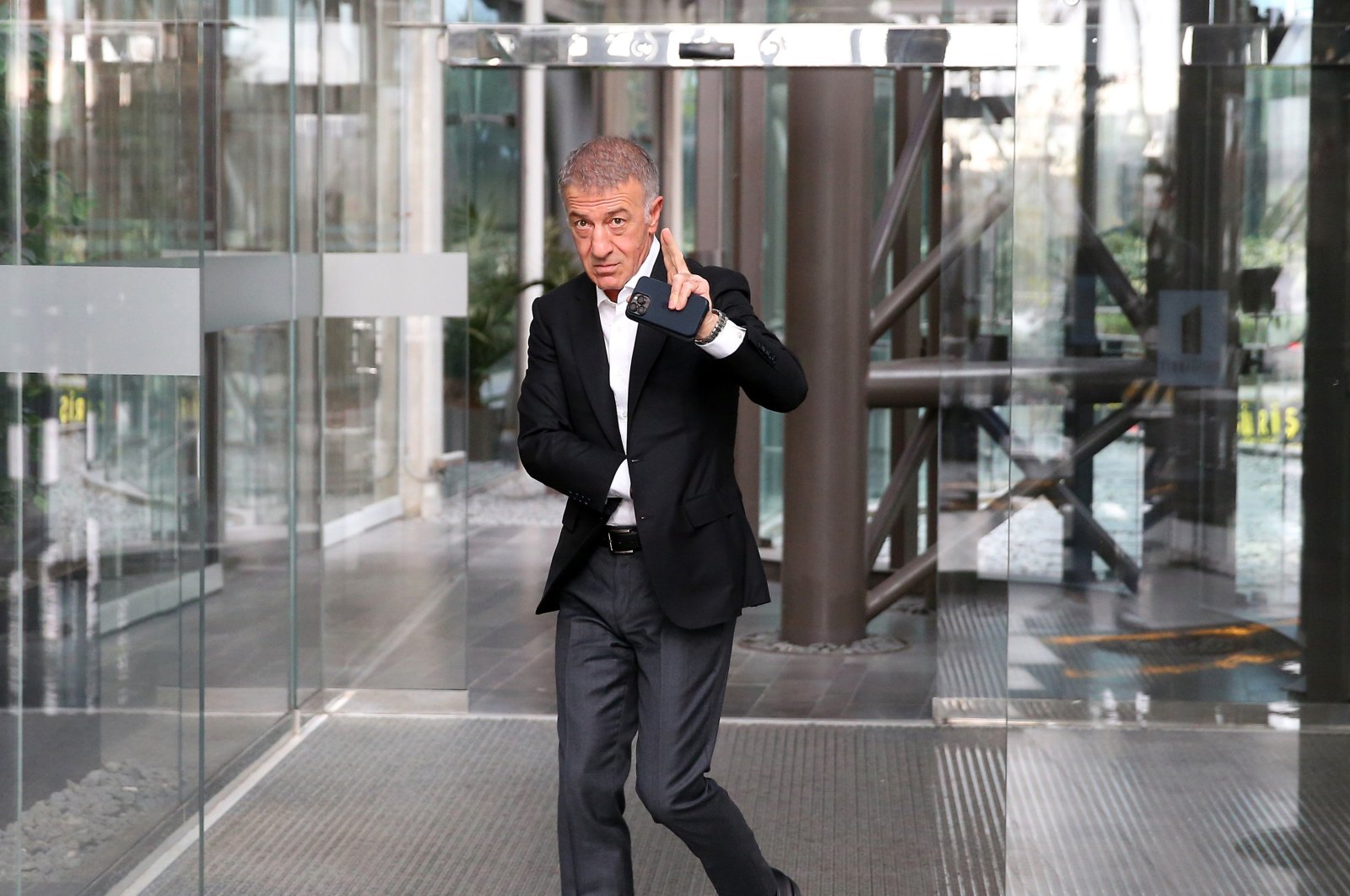 Trabzonspor President Ahmet Ağaoğlu waves at the fans after the Clubs Union Foundation meeting, Istanbul, Türkiye, Nov. 24. 2022. (DHA Photo)