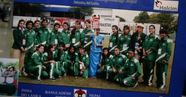 A view of a group photo of a football team that includes Pakistan women&#039;s hockey player Shahida Raza (Front Left), who died when a migrant boat was shipwrecked off the coast of Italy, is displayed for media at her home, Quetta, Pakistan March 2, 2023. (Reuters Photo)