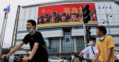 This photo shows a large screen on a building showing promotion for the Chinese People's Liberation Army (PLA), Aug. 4, 2022 - China on March 5, 2023 said it would raise its defense spending by 7.2% in 2023, compared with 7.1% last year, as its outgoing premier warned of growing "external" threats to Beijing's rise. (AFP photo)