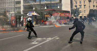 Riot police clash with protesters during a demonstration in Athens, Greece, March 5, 2023. (AFP Photo)