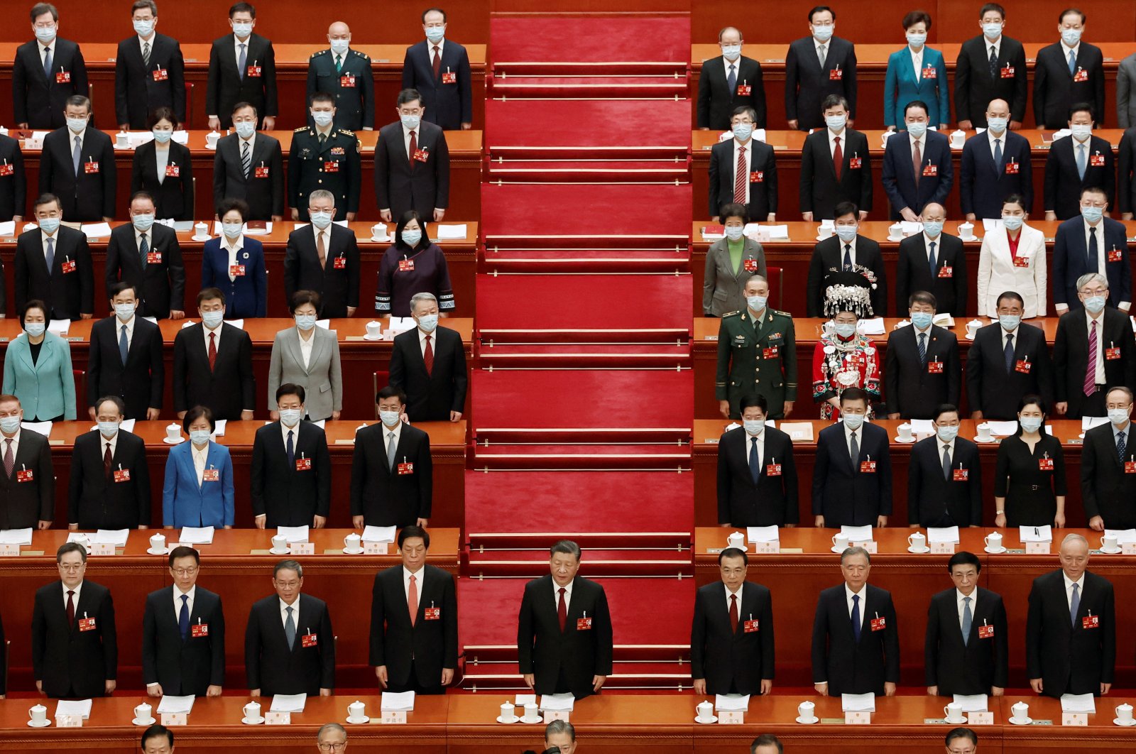 Chinese President Xi Jinping and other officials sing the national anthem at the opening session of the National People&#039;s Congress (NPC) at the Great Hall of the People in Beijing, China, March 5, 2023. (Reuters photo)