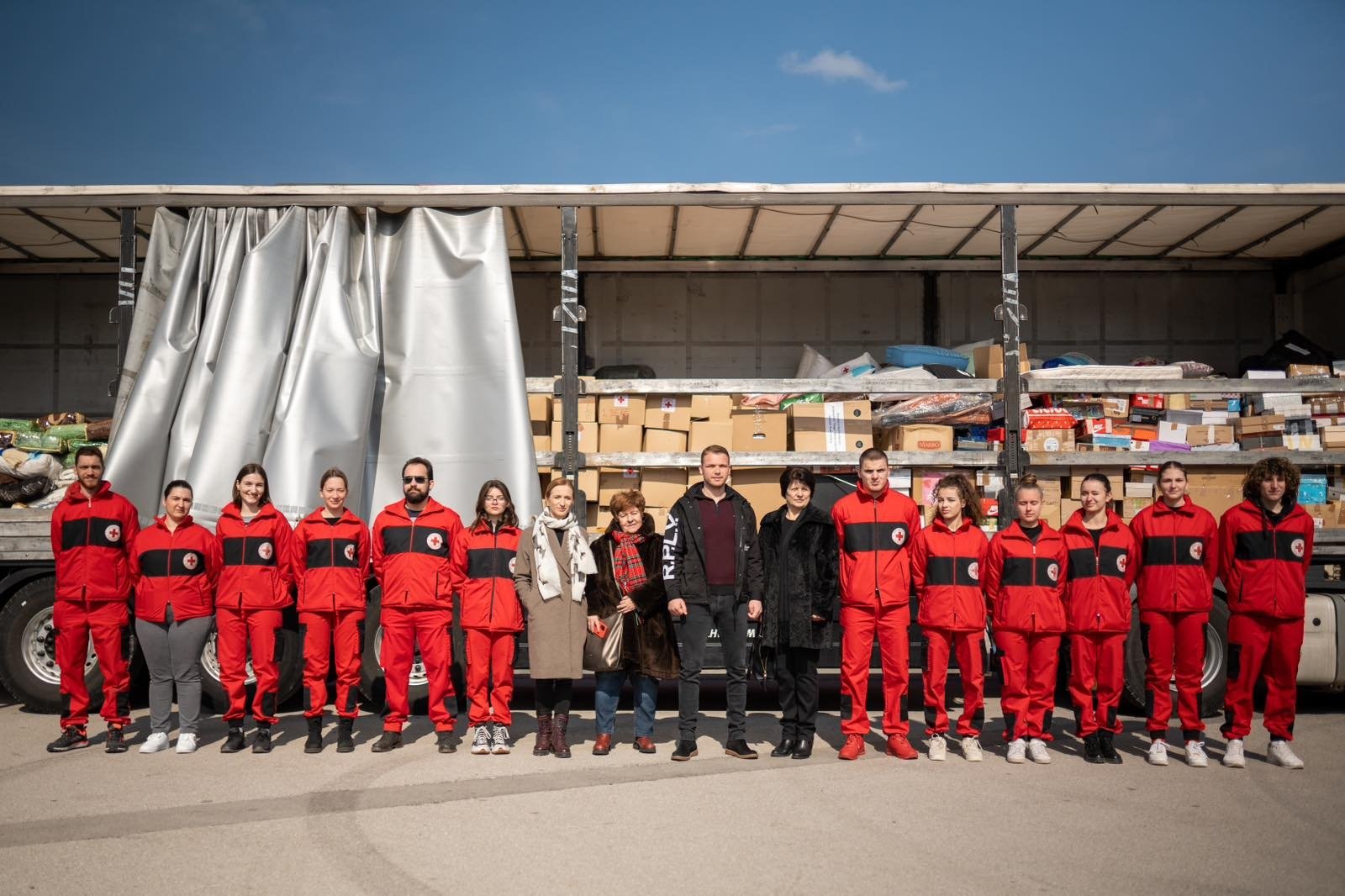 Volunteers and officials from the Red Cross Society of Bosnia-Herzegovina and the United Women&#039;s Association pose in front of a truck loaded with aid materials collected for the victims of the Türkiye earthquakes, in the city of Banja Luka, Bosnia-Herzegovina, March 5, 2023. (AA Photo)