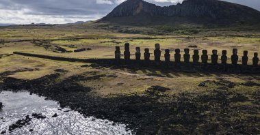 Moai statues stand on Ahu Tongariki near the Rano Raraku volcano, on Rapa Nui, or Easter Island, Chile, Nov. 27, 2022. (AP Photo)