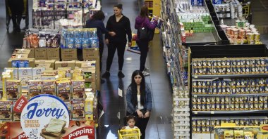 People shop at a supermarket as the prices of goods are declared in U.S. dollars, in Beirut, Lebanon March 1, 2023. (EPA Photo)