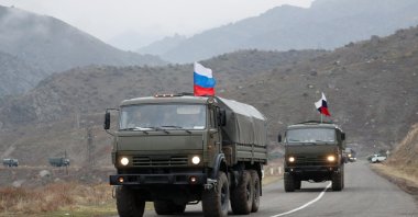 Military vehicles of the Russian peacekeeping forces drive along a road near Lachin in the region of Karabakh, Azerbaijan, Nov. 13, 2020. (Reuters Photo)