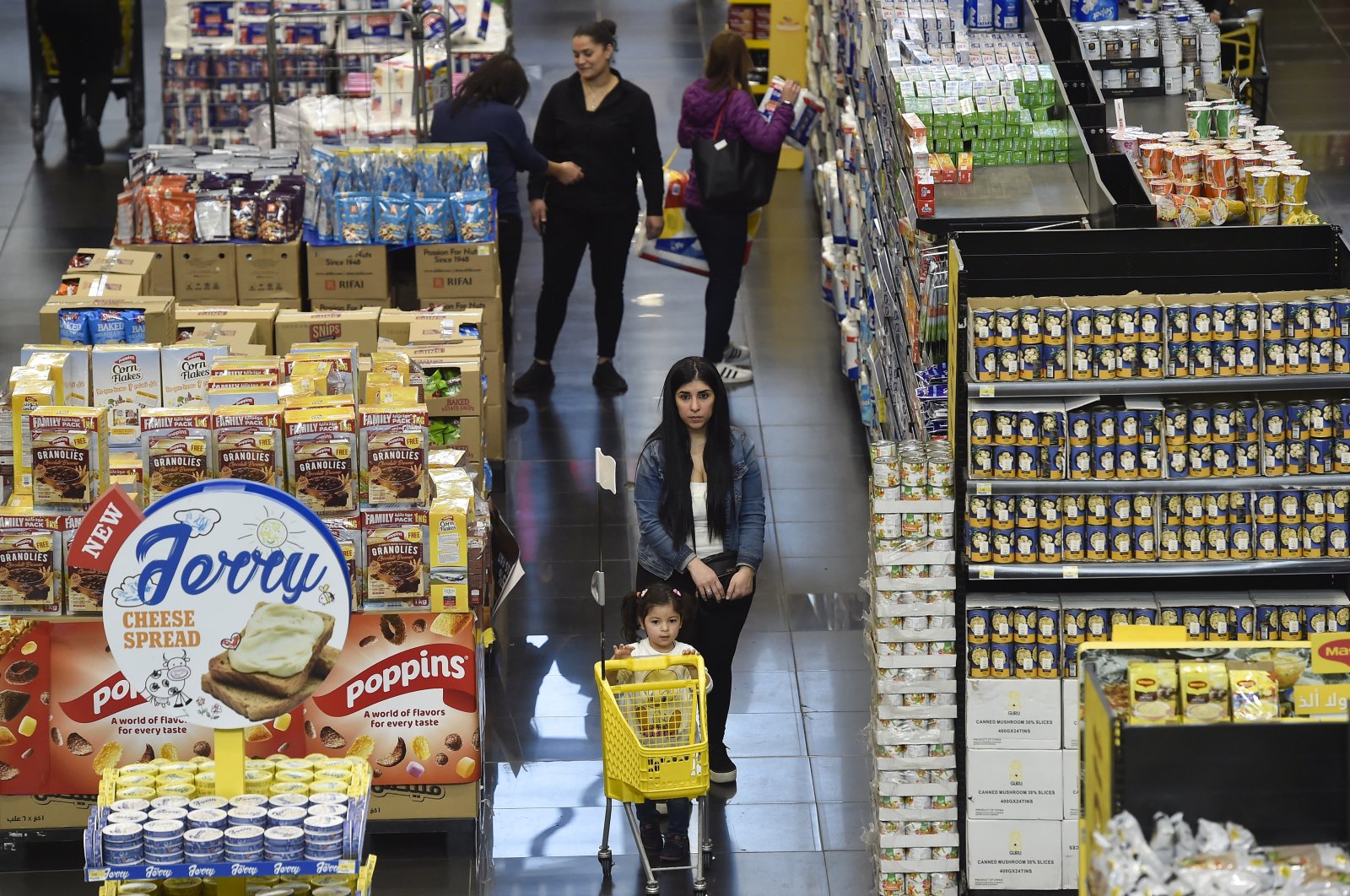 People shop at a supermarket as the prices of goods are declared in U.S. dollars, in Beirut, Lebanon March 1, 2023. (EPA Photo)
