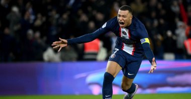 Paris Saint-Germain&#039;s French forward Kylian Mbappe celebrates after scoring a goal during the French L1 football match against FC Nantes at The Parc des Princes Stadium, Paris, France, March 4, 2023. (AFP Photo)