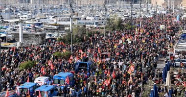 People take part in protests at the Vieux Port (Old Harbor) over the French government's proposed pensions overhaul, Marseille, France, March 7, 2023. (AFP Photo)