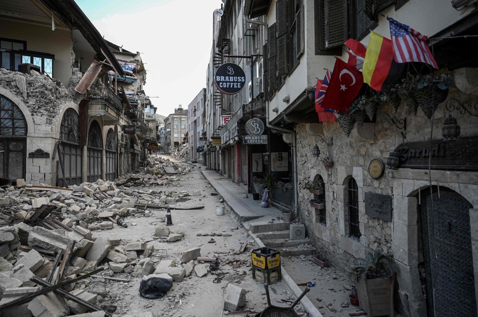 This picture shows collapsed buildings in the historic part of Hatay one month after a massive earthquake struck southeastern Türkiye, on March 6, 2023. (AFP Photo)