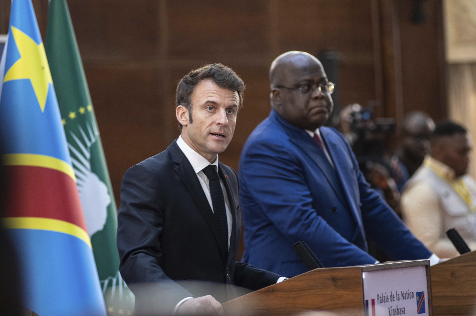 French President Emmanuel Macron (L) adresses media during a joint news conference with Democratic Republic of the Congo President Felix Tshisekedi in Kinshasa, Democratic Republic of Congo, March 4, 2023. (AP Photo)