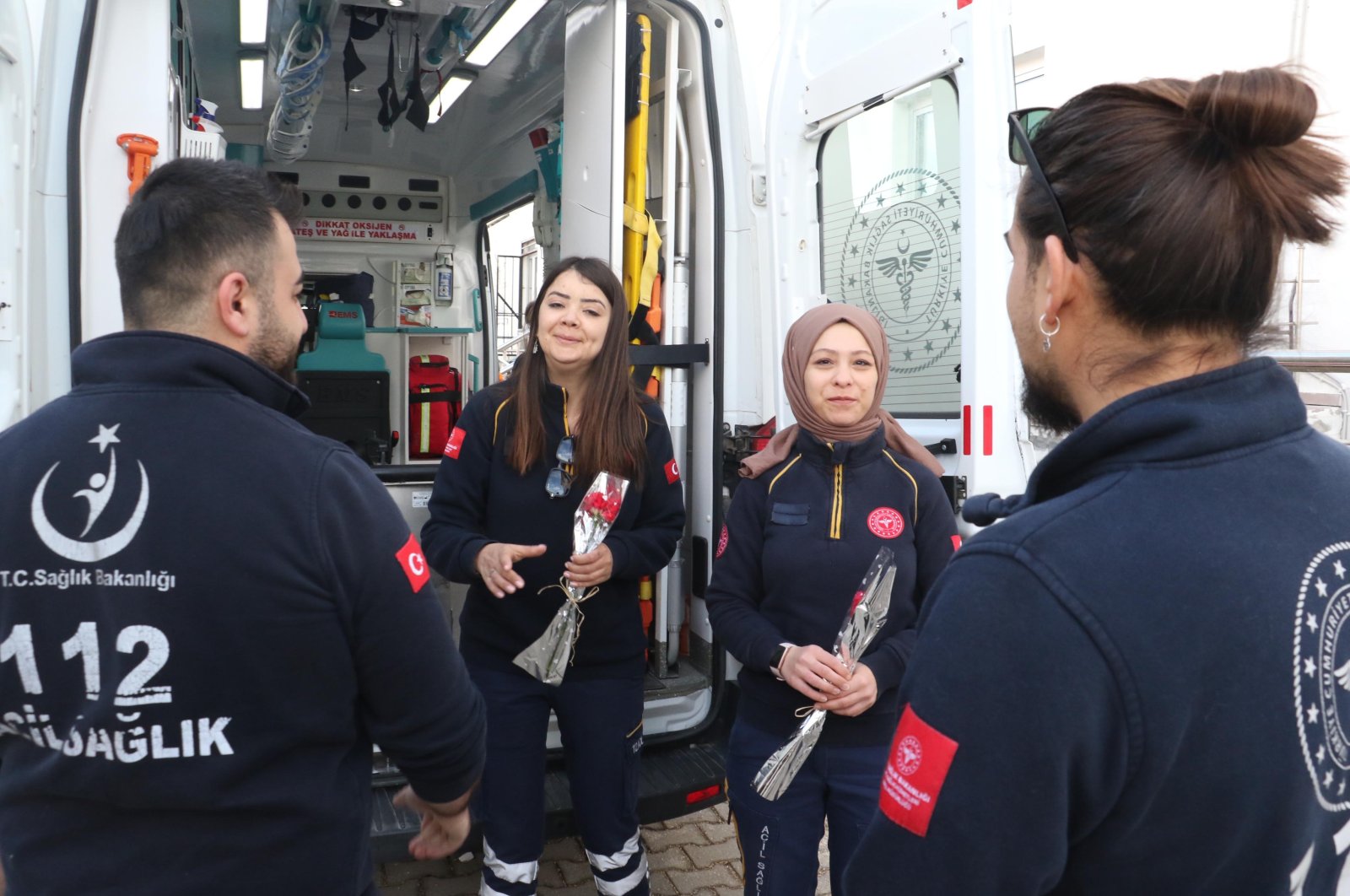 Female health workers at Eskişehir 112 Provincial Ambulance Service were given roses on Women&#039;s Day, March 8, 2023. (DHA Photo)
