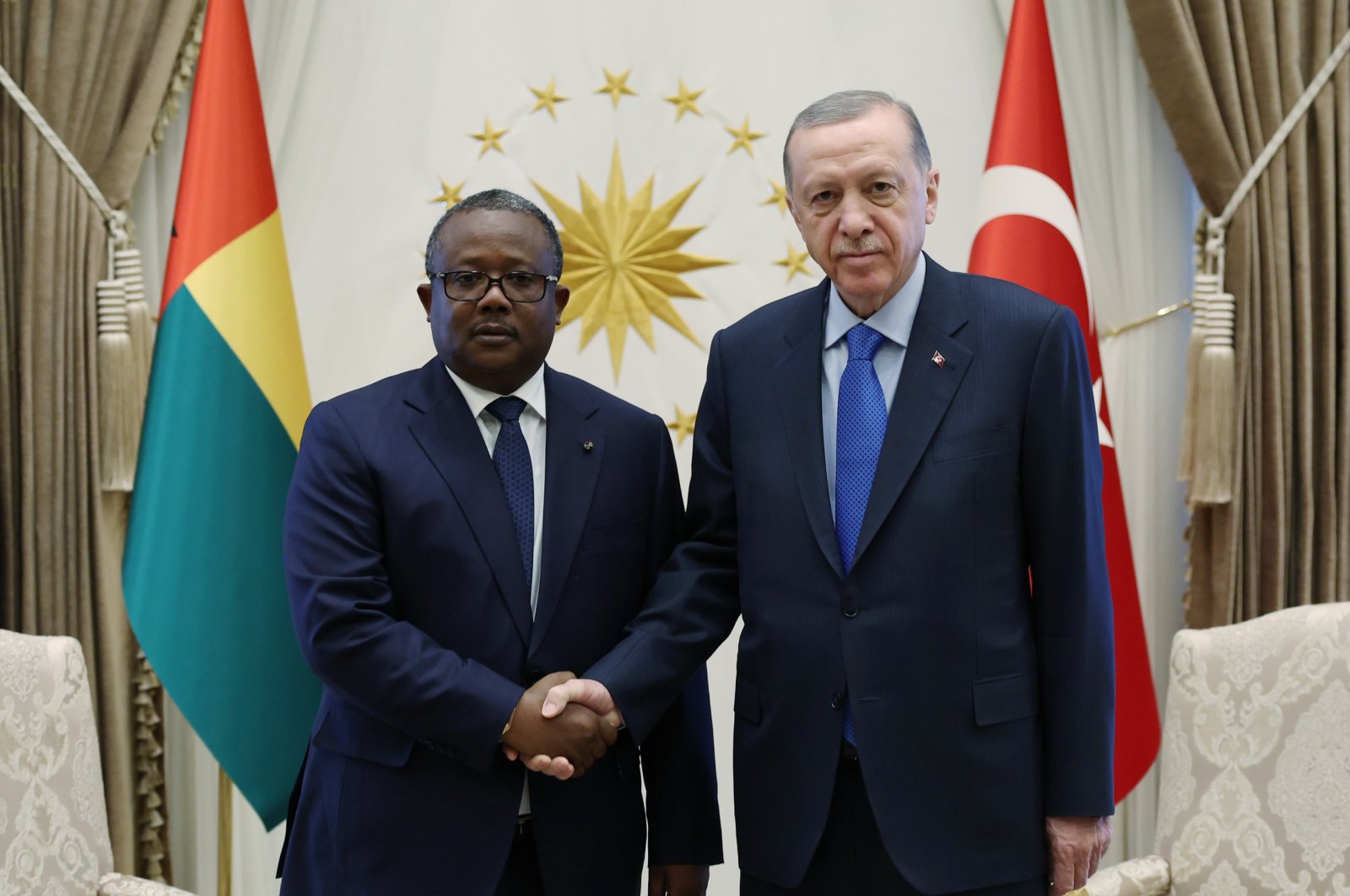 President Recep Tayyip Erdoğan (R) shakes hands with Guinea-Bissau’s President Sissoco Embalo (L) ahead of a meeting in the capital Ankara, Türkiye, March 8, 2023. (AA Photo)
