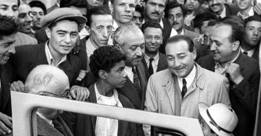 An archive photo of Prime Minister Adnan Menderes and his entourage setting out for the Ankara Provincial Administrative Board building after their election win was confirmed, Ankara, Türkiye, May 15, 1950. (Sabah Photo)