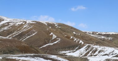 Hilltops are barely covered with snow as less snowfall increases the risk of drought in the eastern Anatolia region, Türkiye, March 9, 2023. (AA Photo)
