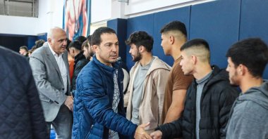 Turkish Wrestling Federation (TGF) President Şeref Eroğlu meets with Kahramanmaraş TOHM athletes in Kızılcahamam district, Ankara, Türkiye, March 7, 2023. (AA Photo)
