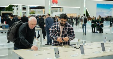 Visitors inspect stands at the Mobile World Congress, in Barcelona, Spain, March 1, 2023. (Getty Images Photo)