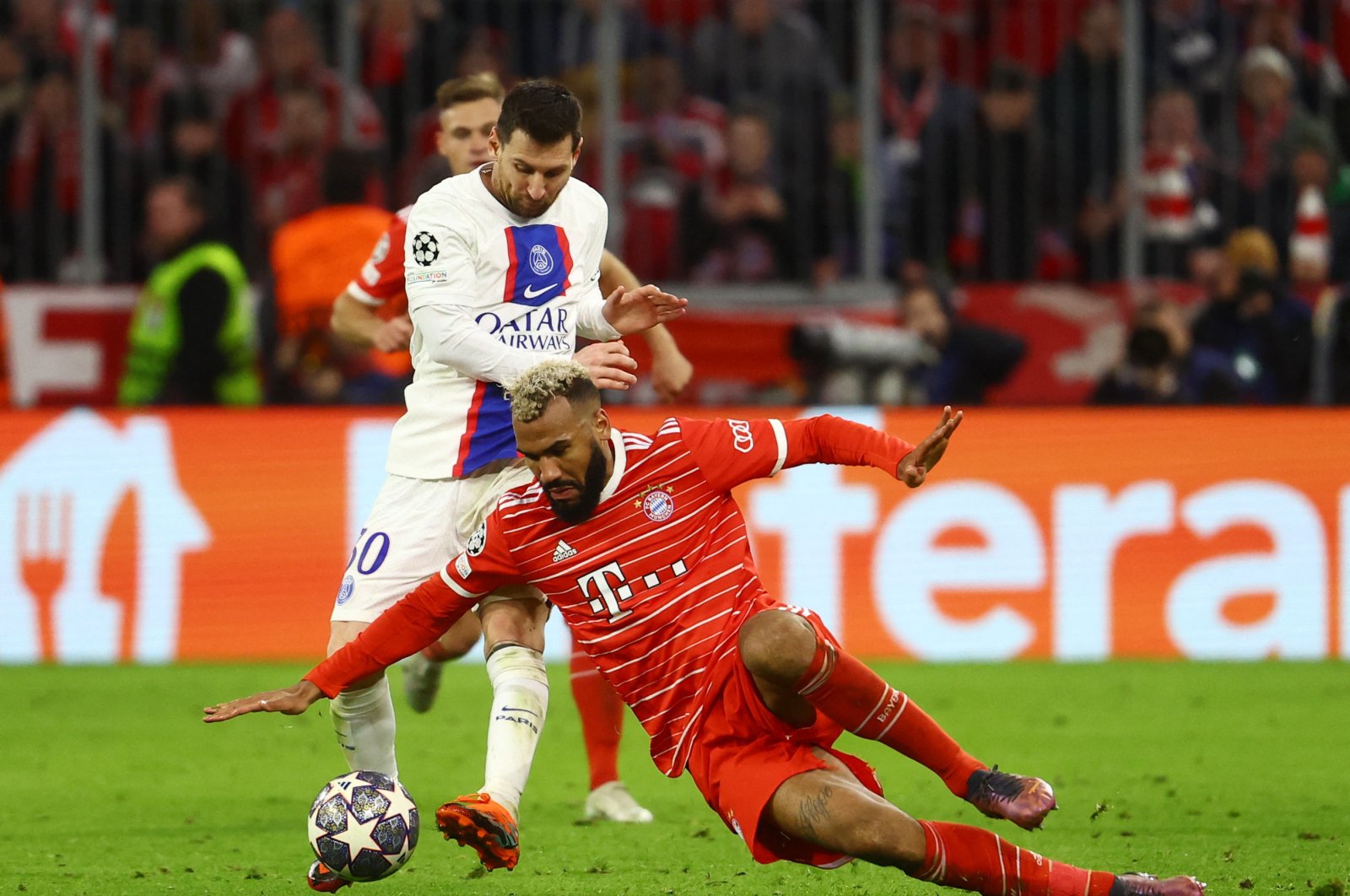 Bayern Munich&#039;s Eric Maxim Choupo-Moting in action with Paris St Germain&#039;s Lionel Messi during Champions League, round of 16, 2nd Leg match at the Allianz Arena, Munich, Germany, March 8, 2023. (Reuters Photo)  