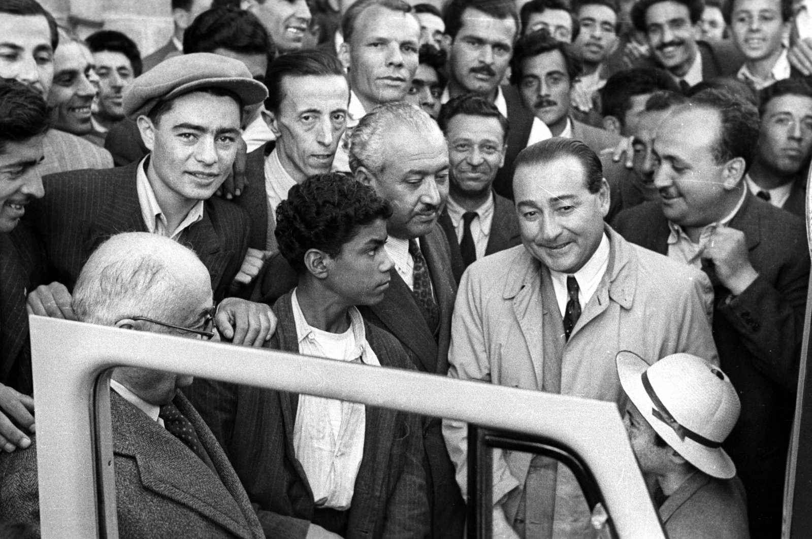 An archive photo of Prime Minister Adnan Menderes and his entourage setting out for the Ankara Provincial Administrative Board building after their election win was confirmed, Ankara, Türkiye, May 15, 1950. (Sabah Photo)