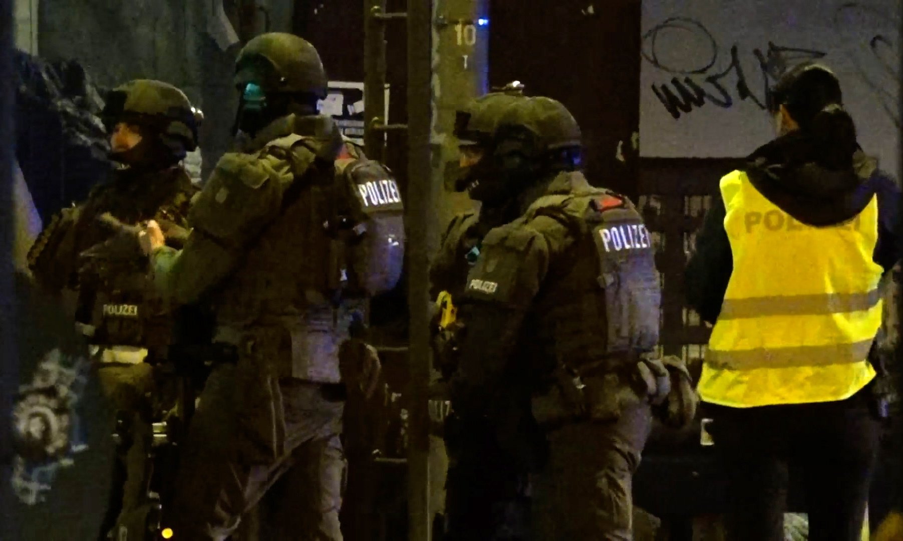 Armed police officers gather at the scene of a shooting in Hamburg, Germany, March 9, 2023. (EPA Photo)