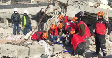 The group of 20 foreigner students join relief efforts in Elazığ, Türkiye, Feb. 22, 2023. (IHA Photo)
