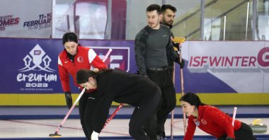 National curling players train ahead of the World Women's Curling Championship held in Sandviken, Sweden, Erzurum, Türkiye, March 10, 2023. (AA Photo)