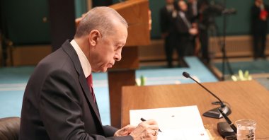 President Recep Tayyip Erdoğan signs a decree announcing that general and national elections will be held on May 14, at the Presidential Complex in the capital Ankara, Türkiye, March 10, 2023. (AFP Photo)