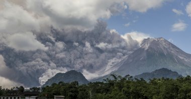 Mount Merapi releases volcanic materials during an eruption in Sleman, Indonesia, March 11, 2023. (AP Photo)