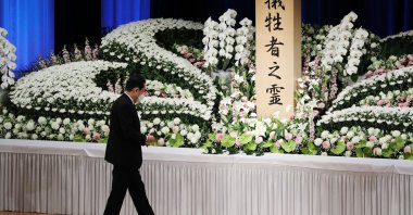 Japanese Prime Minister Fumio Kishida offers flowers at the memorial ceremony to mark the 12th anniversary of 2011 earthquake, tsunami and nuclear disaster, in Fukushima, Japan, March 11, 2023. (AFP Photo)